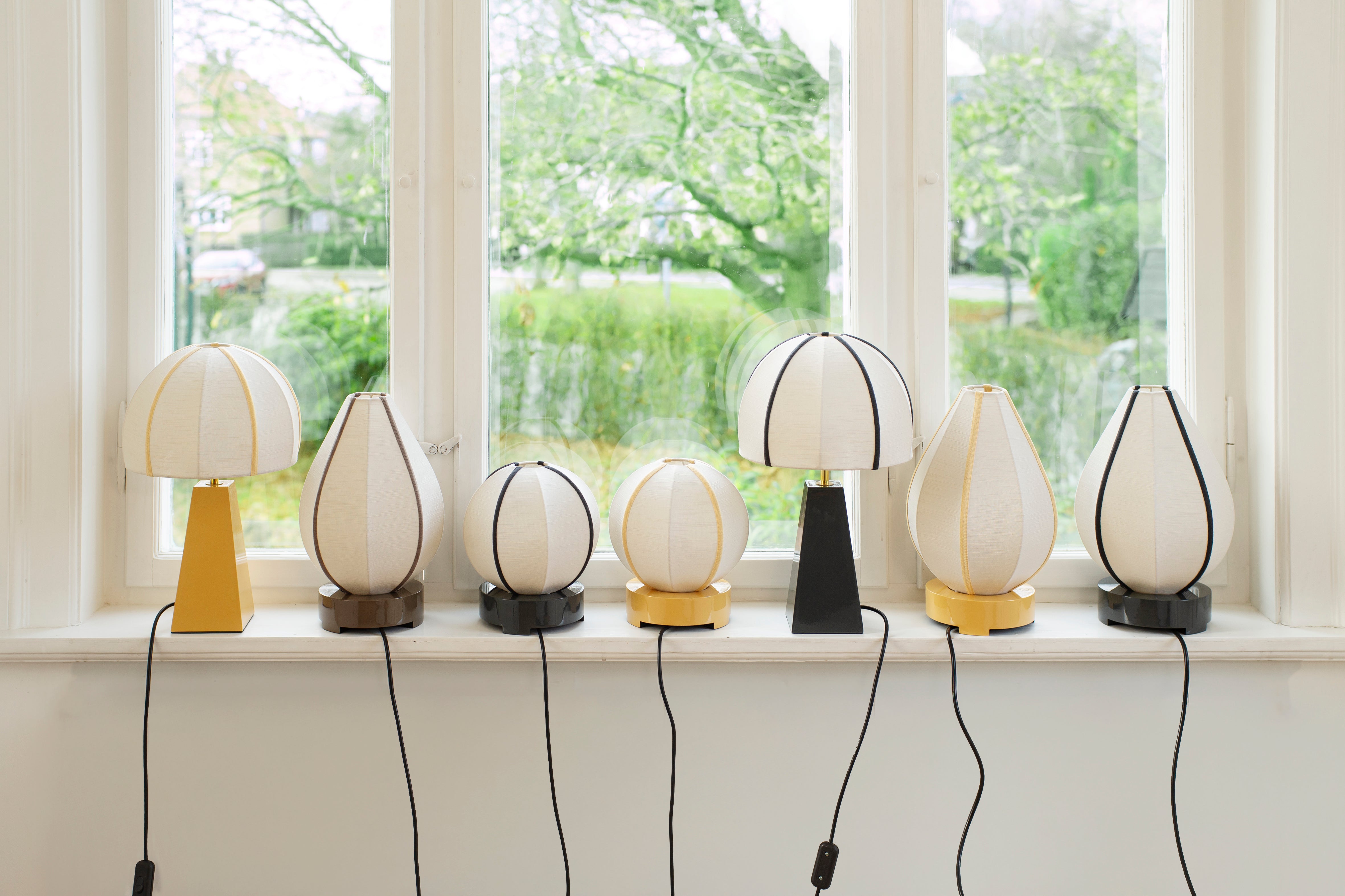 Trapezium lamp base, sun